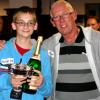 Champion for this year was Michael Staniforth receiving his trophy from Nigel ( and yes that is champagne which we hope Dad, Andrew enjoyed!)