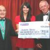 Ray and Nigel present their cheque to Roya, the fundraiser from Derian House