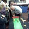 Jamie winds up the handle with the chicks well on their way......