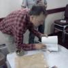 Gordon signs a copy of his book.