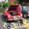 Red roadster from unknown club sells his wares