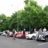 XK140 coupe next to John's MGC GT.