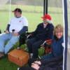 Alison seems to be enjoying herself as Noel and Gill look out at the windswept site