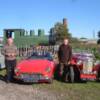 Eric and Ralph pose with their cars as the engine fires up