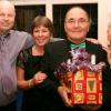 Ray and Pam receive their prize from John and Charmione after winning the Xmas quiz.