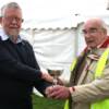 John Armstrong, owner of the Austin Burham, receives his trophy from David Bryant