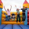 Laura, Thomas and Jack - Junior memebers of West Lancs MG - enjoy the bouncy castle