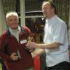 Peter Dobson presents Ken with his trophy