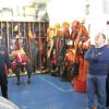 Demonstration of how the dry suits are worn